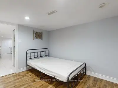 A detached house with a basement entrance and exit suite for rent near Humber College and the city c...
