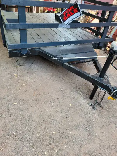 Flatdeck Utility Trailer. 106" by 76" deck size. Width between fenders is 47.5"". Can drive over fen...