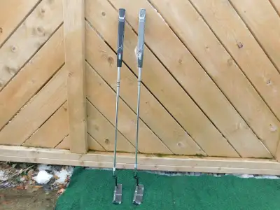 Brand new left hand putters still wrap plastic, View more