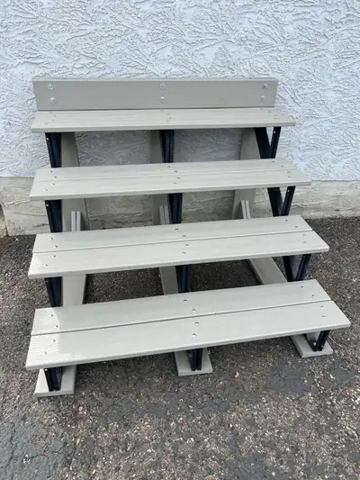 Hot Tub or Swim Spa stairs. Made with steel stringers and grey Trex composite decking boards. Asking...