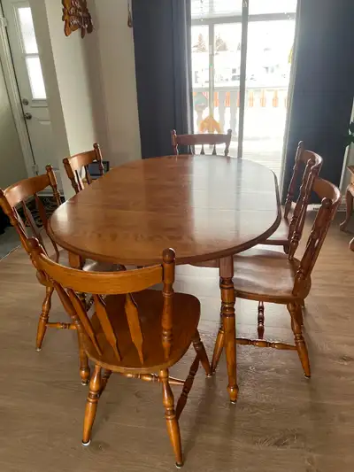 Table and 6 chairs in good condition for 150$with two leaves in, View more