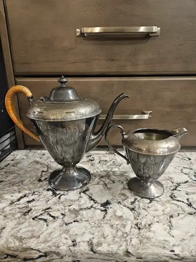 Estate Sale Size: Teapot is 8.5"H, Creamer is 5"H Pick up location: West Glen Cres SW
