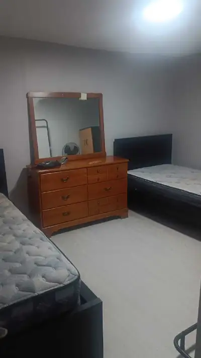 Fully furnished room in basement - At Airport and Thamesgate Rd - Utilities included - Shared washro...