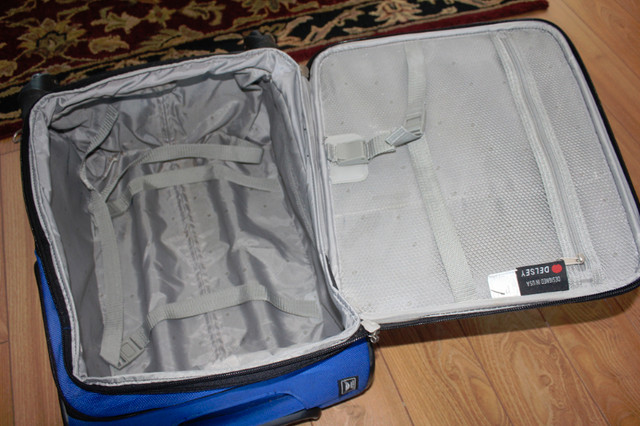 Delsey carry on luggage on 4 wheels with handle and front pocket in Other in North Bay - Image 3