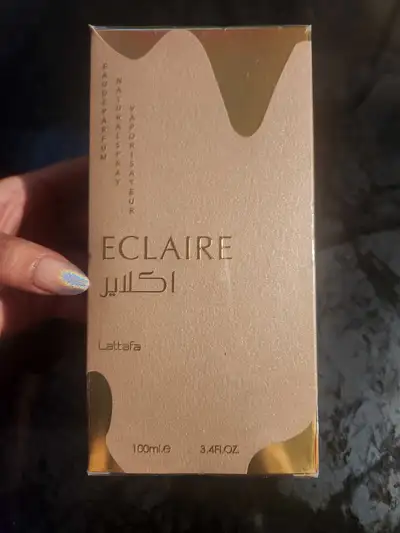 BNIB- Viral and authentic Lattafa Eclaire Eau De Parfum 100ml. Scent Profile: Top Notes: Caramel, Mi...