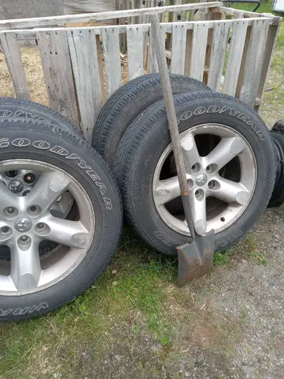Set of 275 65 r20 dodge ram wheels tires are weathered but still usable still lots of tread looking...