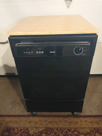 In great condition Kenmore portable dishwasher. Everything works asking $350 , can deliver.