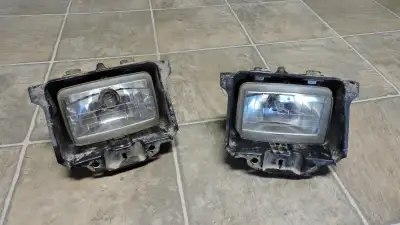 2 Headlight covers with headlights & bulbs Please verify your own fit Cash only pickup Welland