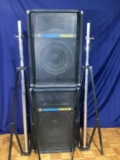 Yorkville Pulse 153 speakers in very good condition, with solid steel extra heavy duty tripod stands...