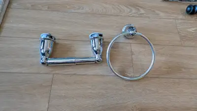 Matching toilet paper holder and ring hand towel holder. Willing to sell separately for $5 each. Pic...