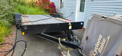 2023 HD car hauler utility trailer, only used three times, 10,000lb axles, comes with loading ramps....