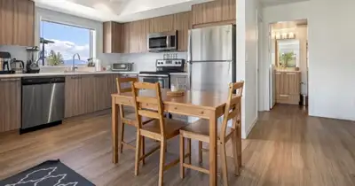 This is a listing for U-2 academy way. It features a full kitchen, living room, bathroom and bed roo...
