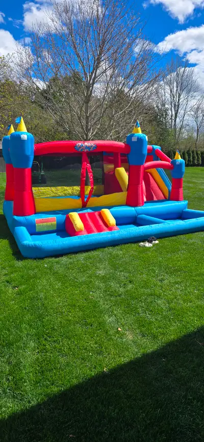 Blast zone bouncy castle, View more