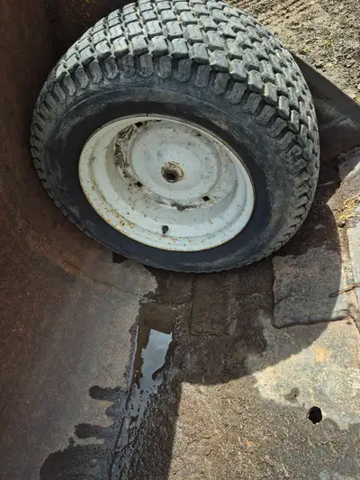Tires and rims larger than standard lawntractor Tires rear 30$