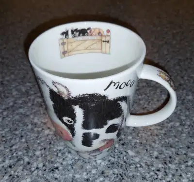 Here's a Roy Kirkham mug, it's fine bone china and made in England. This is from the Please Shut the...