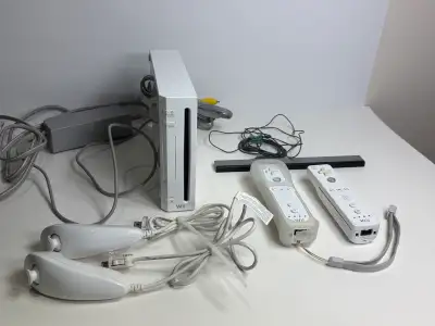 Complete Nintendo Wii setup — everything you need in one bundle. Wii console (white) ️ 2 Wii Remotes...