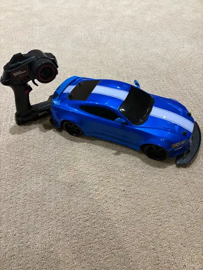 Rc car and controller . Long battery life and charger included for charging the car. Mainly used for...