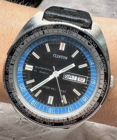WORL TIMER - CLINTON - 25 JEWELS AUTOMATIC - DAY/DATE STAINLESS, View more