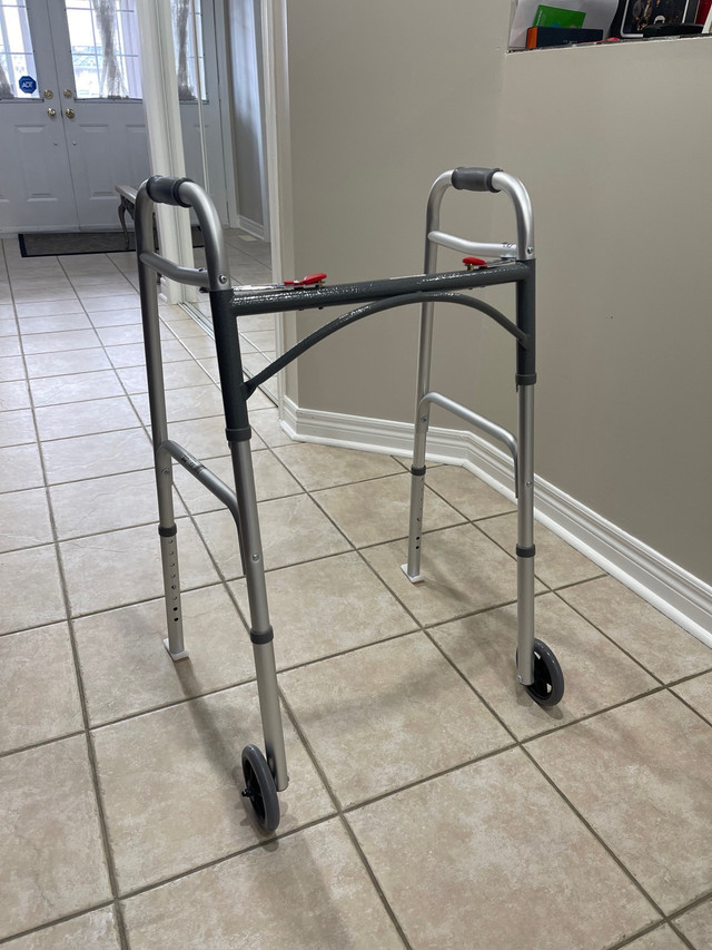 Walker with two button folding and  ski glides attached   in Health & Special Needs in Mississauga / Peel Region