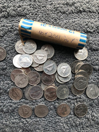 Full roll of 2001 “no p”nickels coins