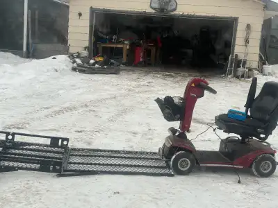 - Good Condition - Carrier goes into any trailer receiver with ramp - New Battery - New Battery Char...