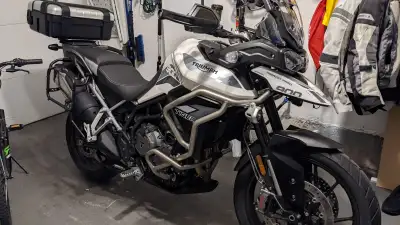 This pre-owned Triumph Tiger 900 GT Pro is a versatile adventure motorcycle featuring a powerful 900...