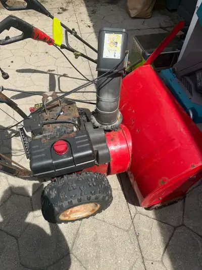 This Yard Machines snow blower is a reliable winter workhorse, featuring a sturdy engine and durable...
