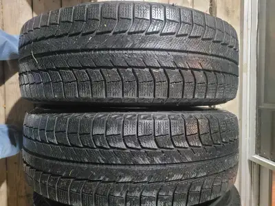 Gently used set of winter tires. Michelin Latitude X-ICE 235/65R17 They measure 8/32. Lots of life l...