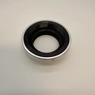 Vintage KE lens mount adapter ring made in Japan. Solid metal construction. Good condition with some...