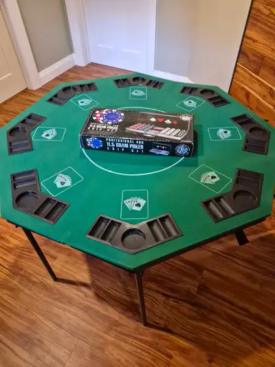 Table is an octagon shape 4'x4 in size. Asking: $180 for Poker Table & $40 for Professional 400, 11....