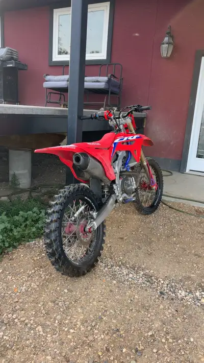 Selling my 2022 crf450r, has a bunch of spare parts, plugs, caps, plastics etc. seeking because I lo...