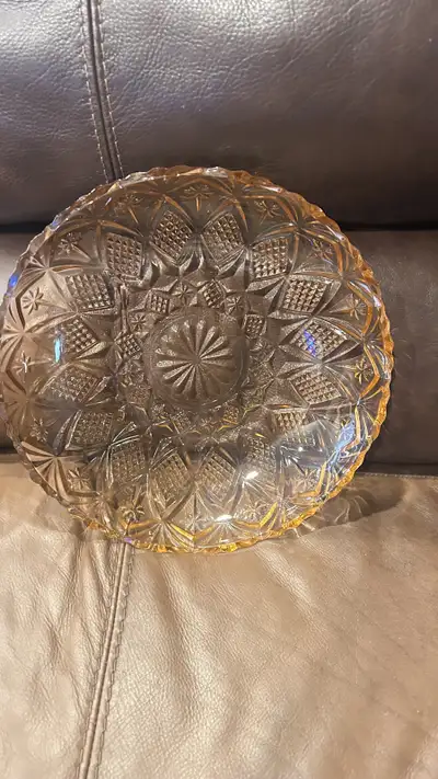 This is a used vintage glass plate with a decorative pattern. It would make a beautiful addition to...