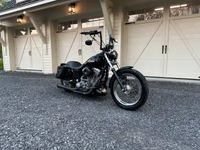 This bike is a real head turner. Has S&S air breather. Leather saddle bags. 10” Handle bars with new...