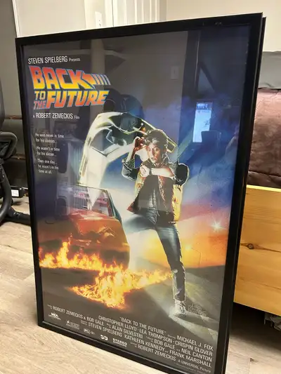 24”x36” movie poster in glass frame
