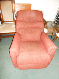 Burgundy cloth rocker / recliner armchair