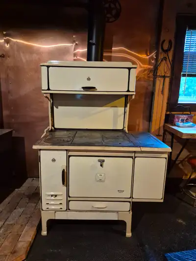 Wood cookstove, McClary Dutchess 2500. In working condition. We used it in our cabin for cooking and...