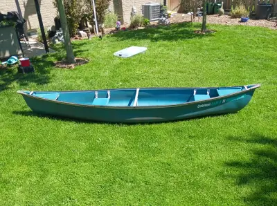 13 foot canoe: RAM-X 13 and 2 paddles and 2 roof racks for truck, all in good condition. 2 XXL Outbo...