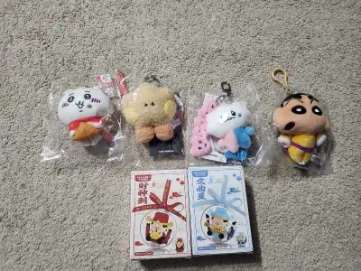 Add a touch of charm to your collection with this assortment of new, sealed anime-inspired plush key...