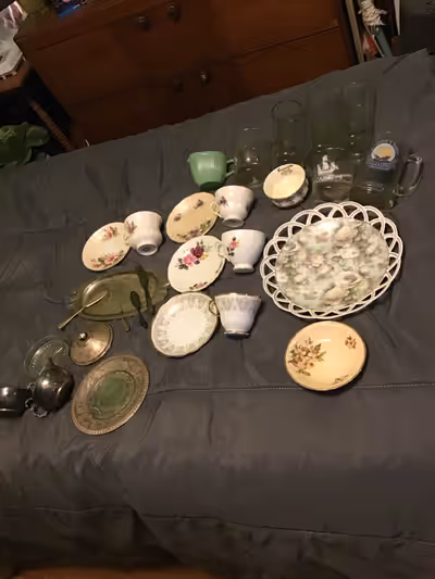 Includes various pieces of china (cups and saucers), Petro Canada collectable glasses, Cabot 500 gla...