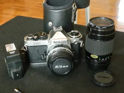 Nikon FE2 35mm Camera Nikon 50mm lens Sigma 70-210mm Sigma Zoom K Lens Shutter release cable Flash C...