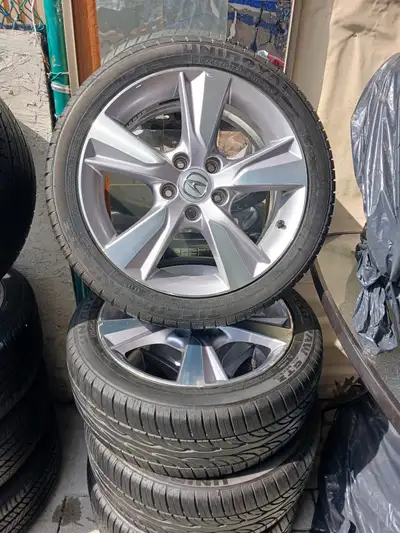 USED FOR ONLY FOR 2 YEARS. All 4 tires. 215/45ZR17XL 91W Made from uniroyal. Made in the 10th week o...