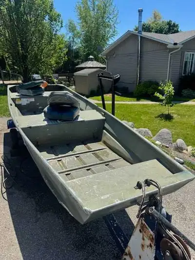 14' Jon Boat. Used for duck hunting last few years. 2 swivel seats , older 2hp Johnson that starts a...