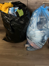 2 garbage bags of clothes 