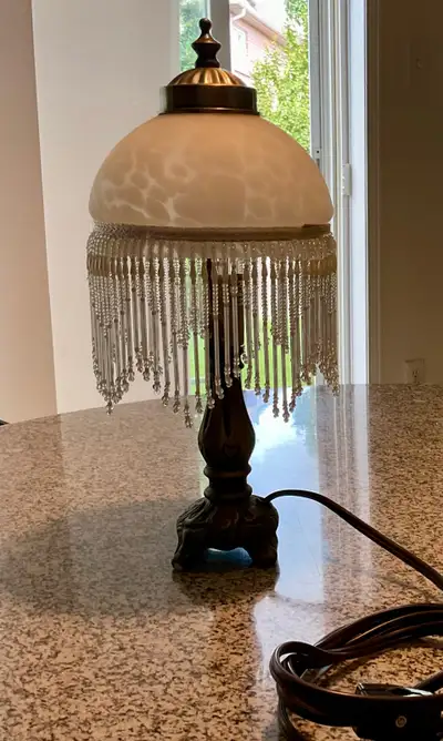 Lamp with white glass dome, pendant beads & metal base, View more