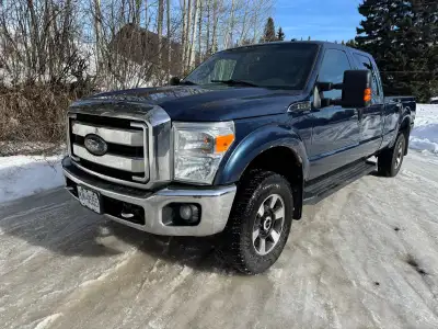 2016 F-350 6.2L gas engine, full loaded lariat. Winter and summer tires and rims