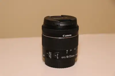 Canon EFS 18-55mm lens in good working order. Lens caps included. Tested immediately before posting...
