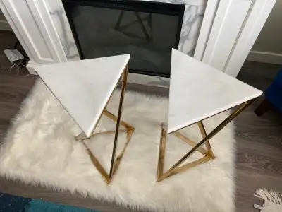 Set of 2 Everly Quinn Kierstyn end tables with triangle tops and gold metal bases (see photos). Grea...