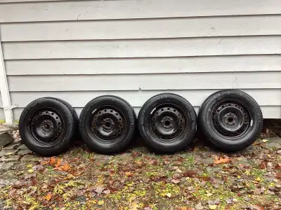 These tires are on steel rims suitable for VW Tiguan. 5 mm of tread remaining.