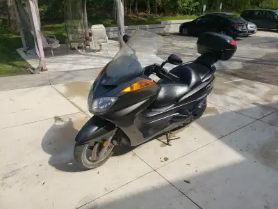 Get ready to cruise with this Yamaha Majesty scooter, a sleek and comfortable ride for urban commute...