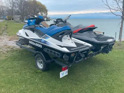 2 Seadoos + Trailer - Package Deal - $16,500! Package Includes: 2014 GTX 215hp Supercharged (Grey) -...